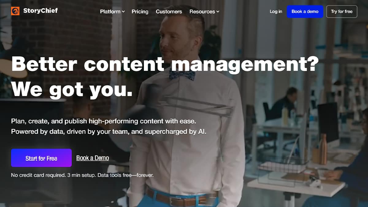 Screenshot of StoryChief homepage with the headline ‘Better content management? We got you.’ and subtext promoting AI-powered content creation, planning, and publishing. Background shows a man in business attire standing in a modern office. Buttons read ‘Start for Free’ and ‘Book a Demo.’